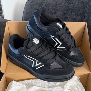 Vans Black and White Men's (size 7.5) or Women’s (size 9) Sneakers